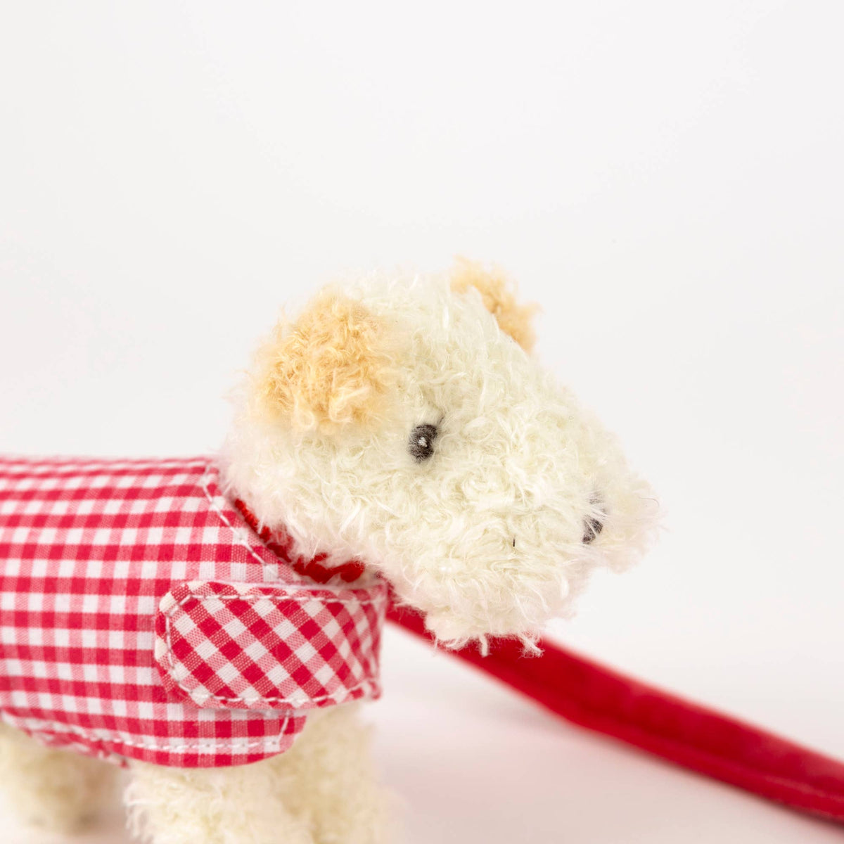 Plush Jack Russell Terrier Dog with Leash and Coat in a Basket