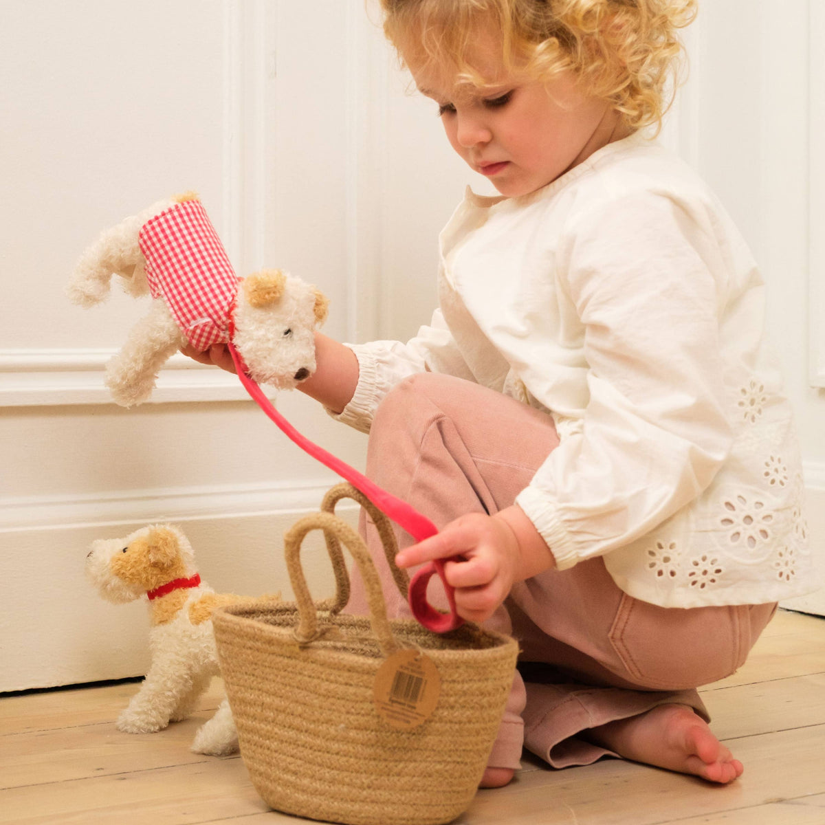 Plush Jack Russell Terrier Dog with Leash and Coat in a Basket